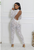 Kauna White Mesh Lace and Pearls Jumpsuit